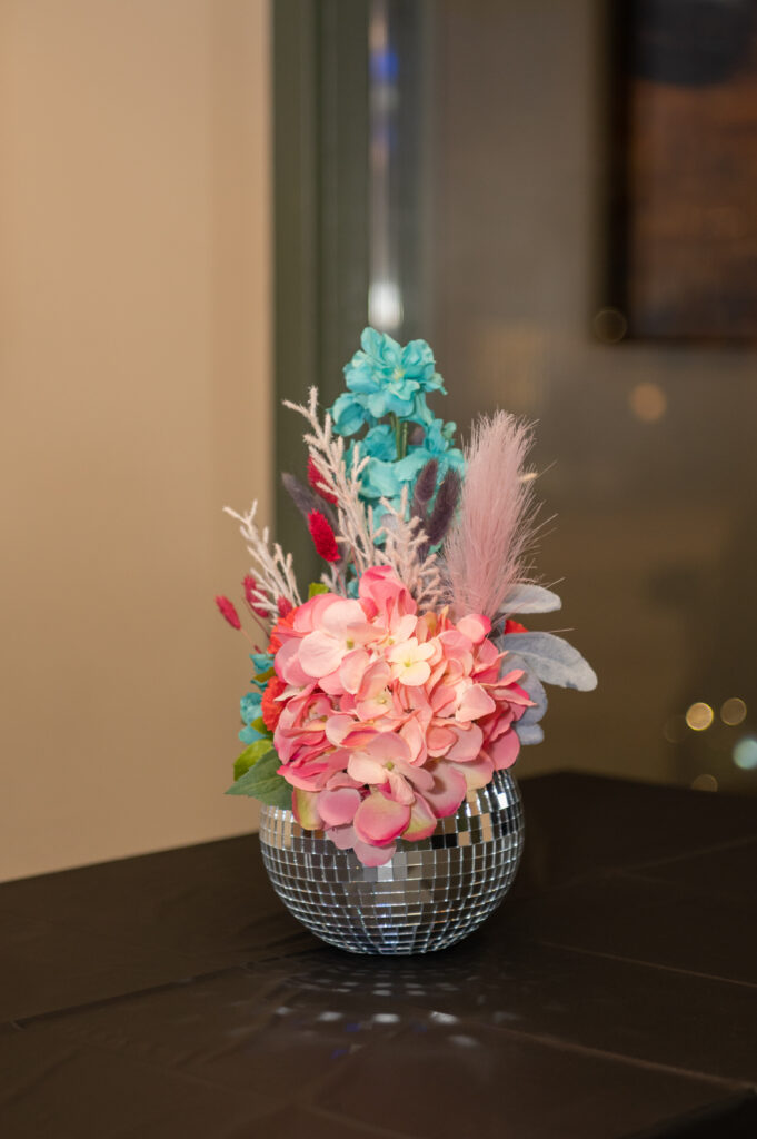 Disco ball centerpiece with florals